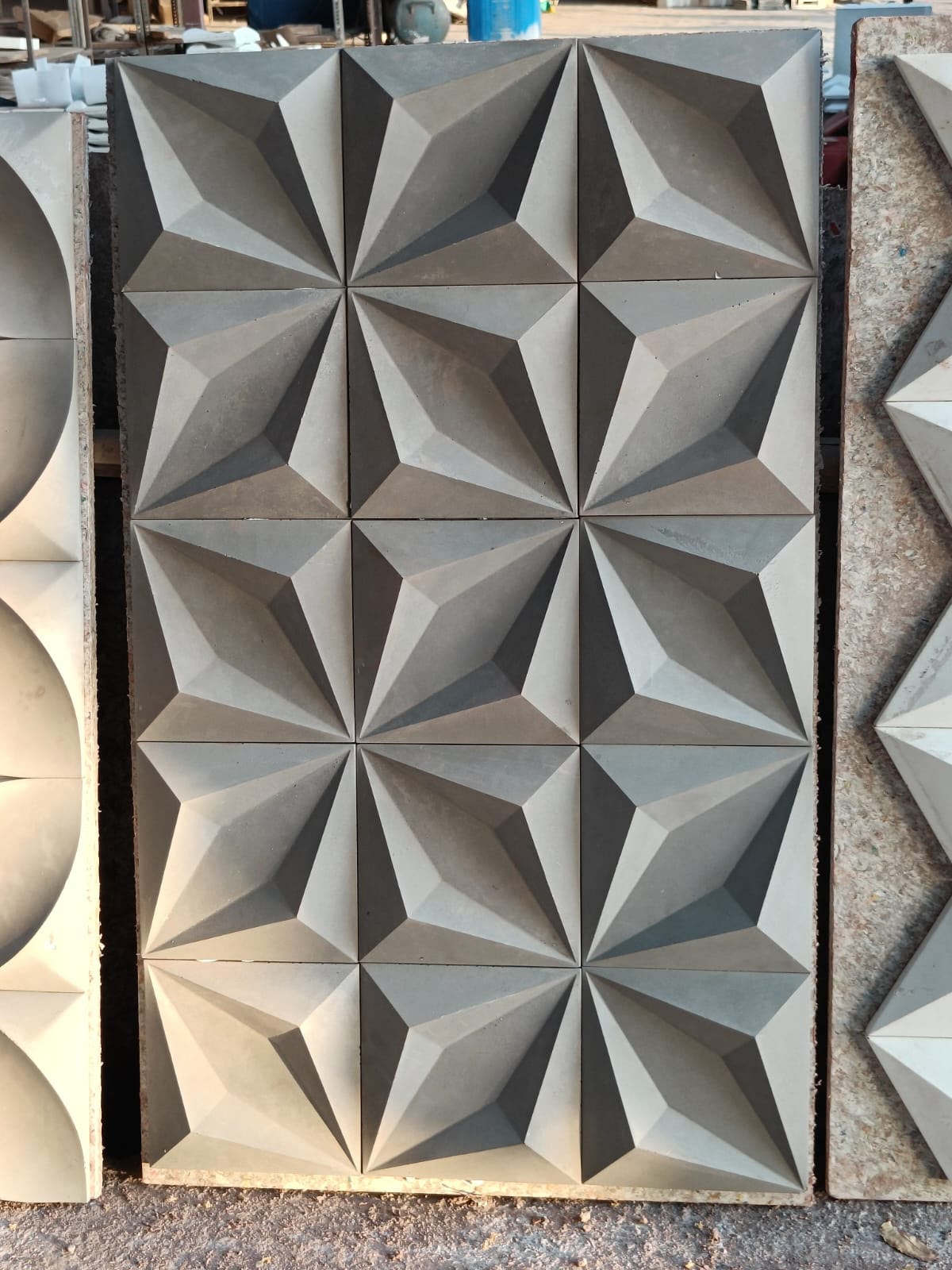 Stacked star-pattern elevation panels at the factory